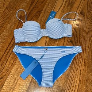 NWT TRIANGL neoprene swimsuit. Both top and bottom are size medium